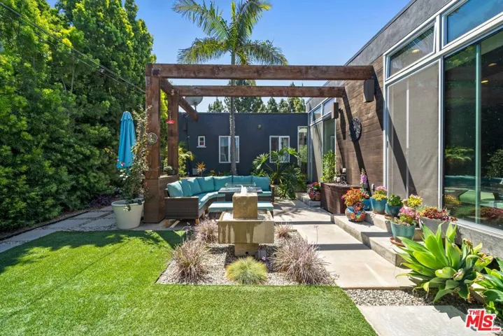 Landscaped backyard featuring