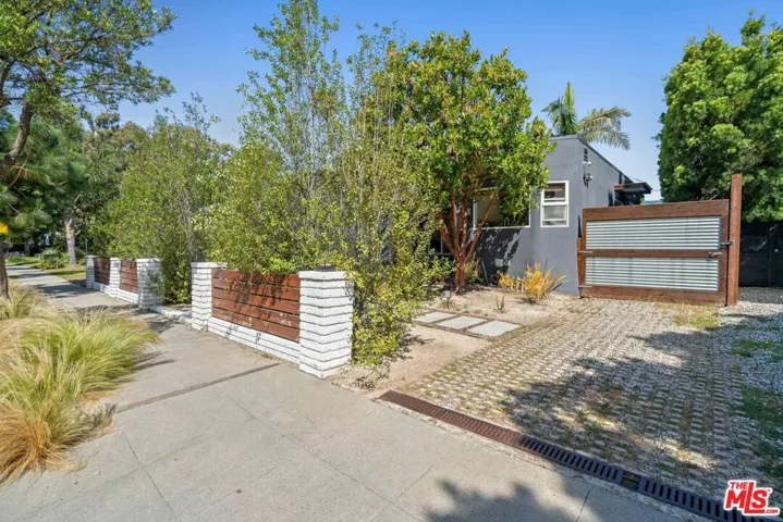 Front yard featuring a wood an