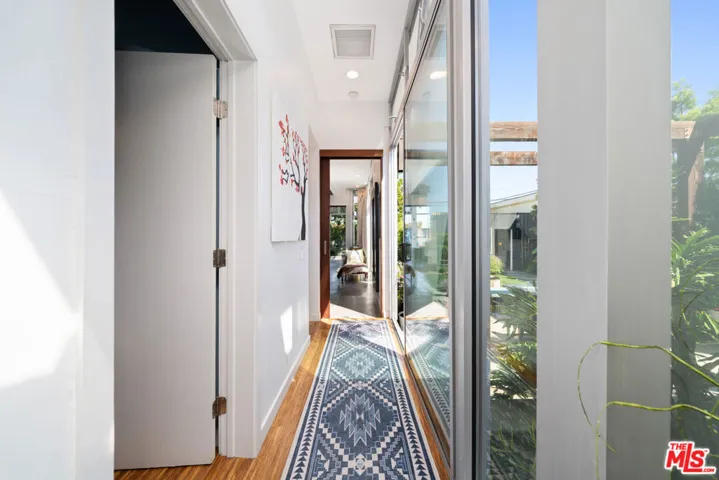 Modern hallway featuring hardw