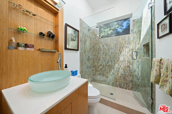 Bathroom featuring a bamboo va