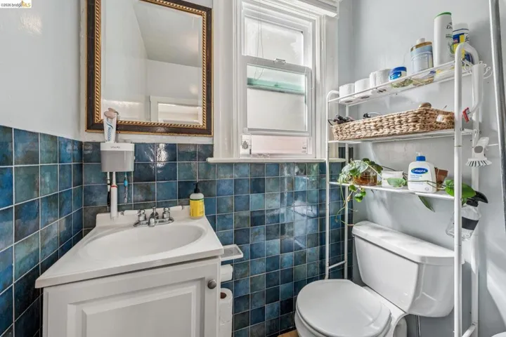 Updated full bathroom featuring a claw foot tub.