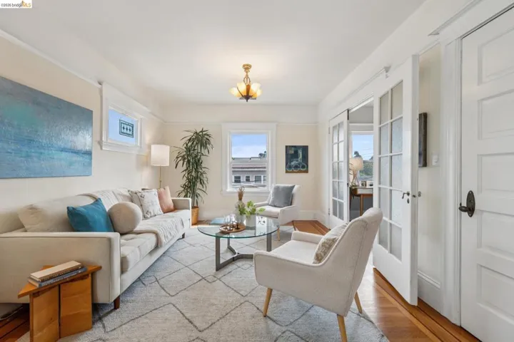 Living room has an original lighting fixture.