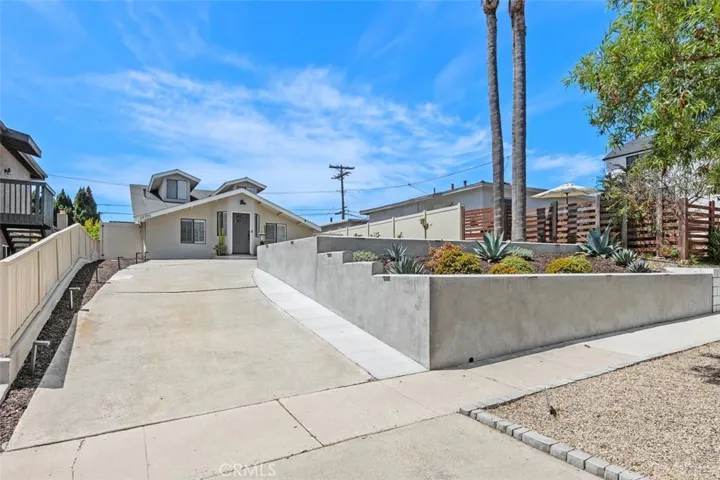 Sweeping driveway adds extra parking.