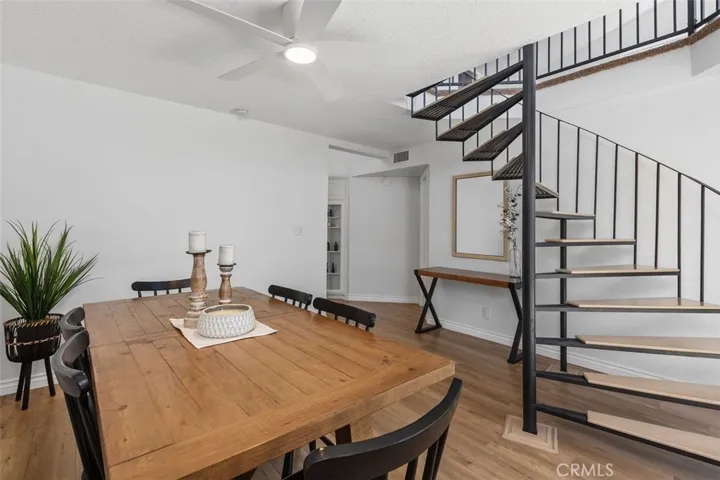 The dramatic staircase leads to the second floor.