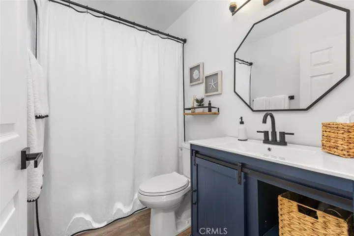 The main bathroom has been updated with tasteful accents.