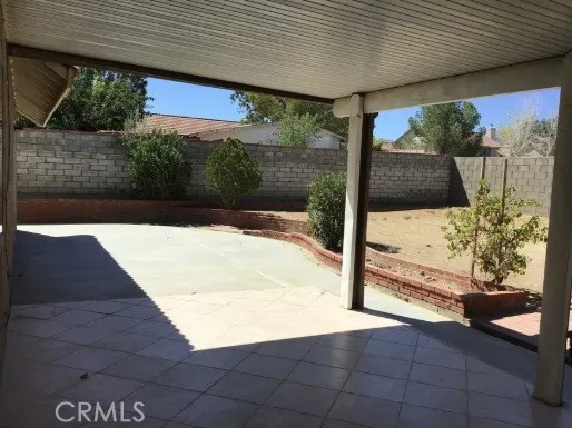 Expansive back yard is fully enclosed