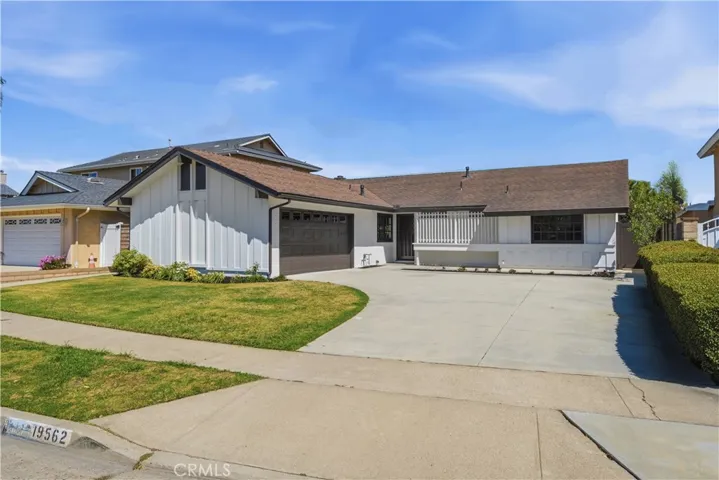 Clean exterior presentation with updated paint and landscaping.