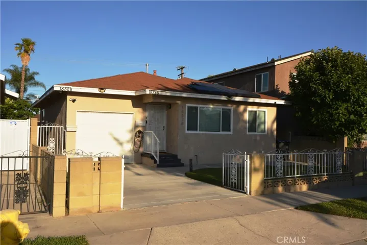 View from the street of the front home - Note the 2 separate addresses - Back home is for lease