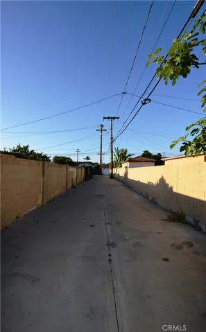Other side of the alley from the back of the home.