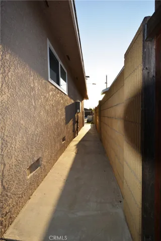 View from the side of the front house towards the front.