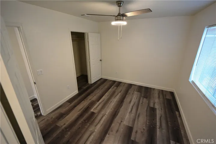 View of large bedroom number 1 - both bedrooms have window coverings