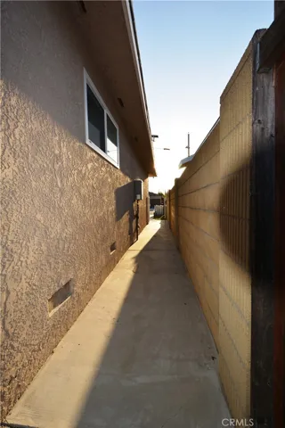 View from the side of the front house towards the front.