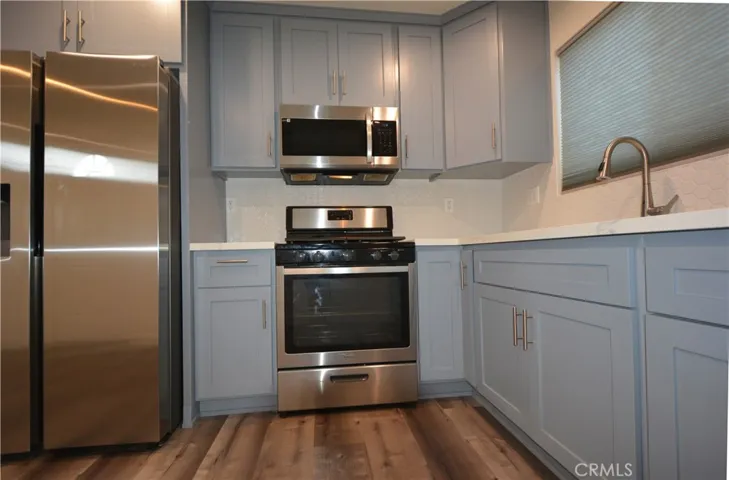 Lots of cabinets and built-in microwave oven
