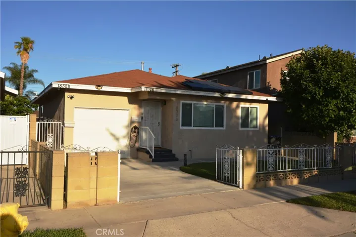 View from the street of the front home - Note the 2 separate addresses - Back home is for lease
