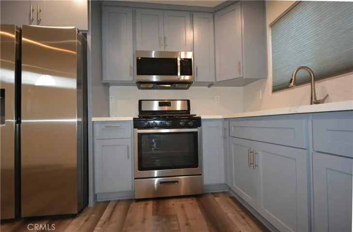 Lots of cabinets and built-in microwave oven