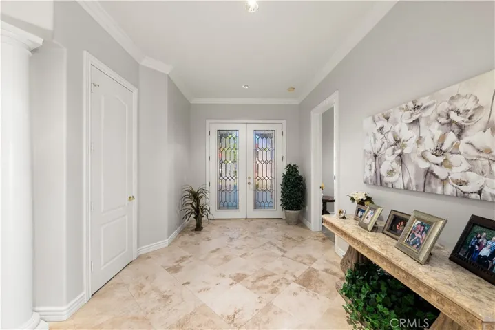 Front Entry View with Double Doors and High Ceilings.