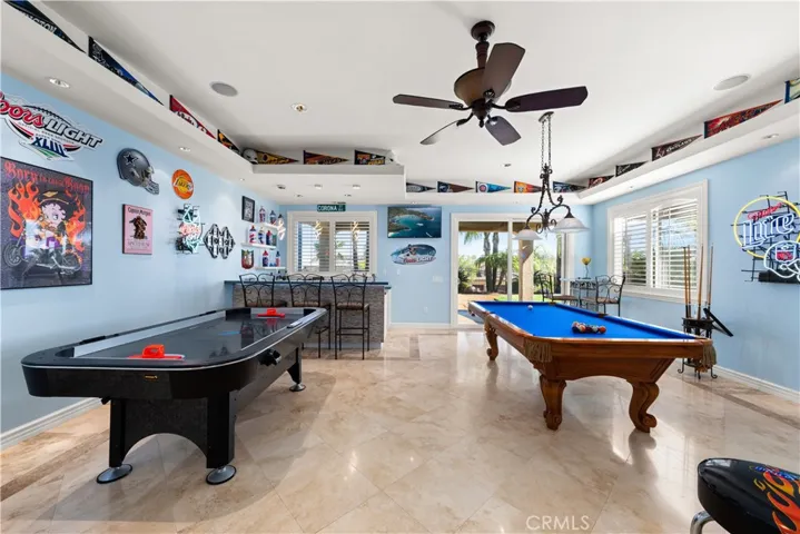 Game Room with Color Changing Lights- Air Hockey and Pool Table Remain with the Property