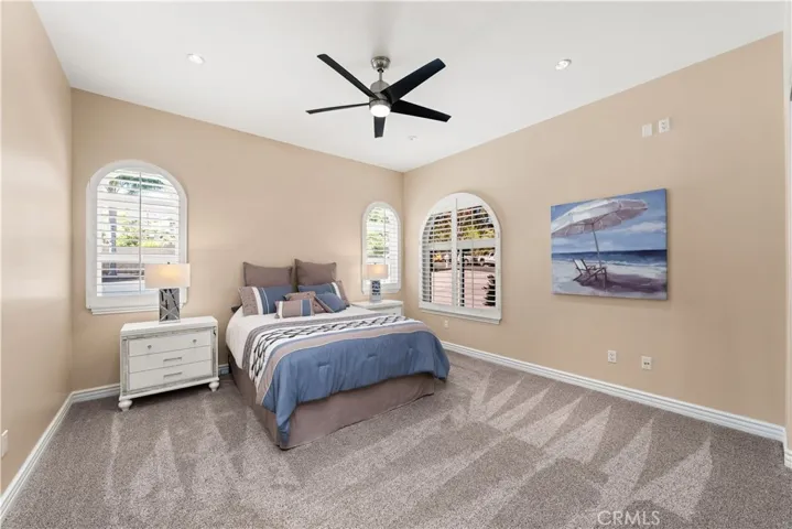 Bedroom #3 with Views of the Front and Side of the Properpty.