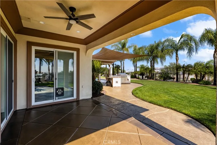 California Room off Kitchen and Family Room with Ceiling Fan and Recessed Lighting