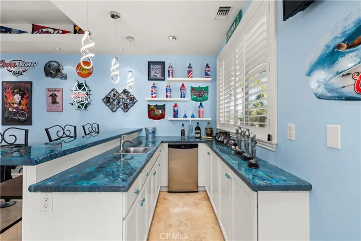 Custom Resin Countertops, Cabinets for Storage, Sink and Small Refrigerator