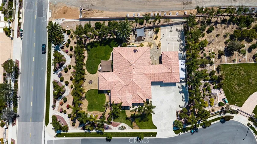Spanning Just Under an Acre, This Stunning Property Offers the Perfect Blend of Openness and Privacy.