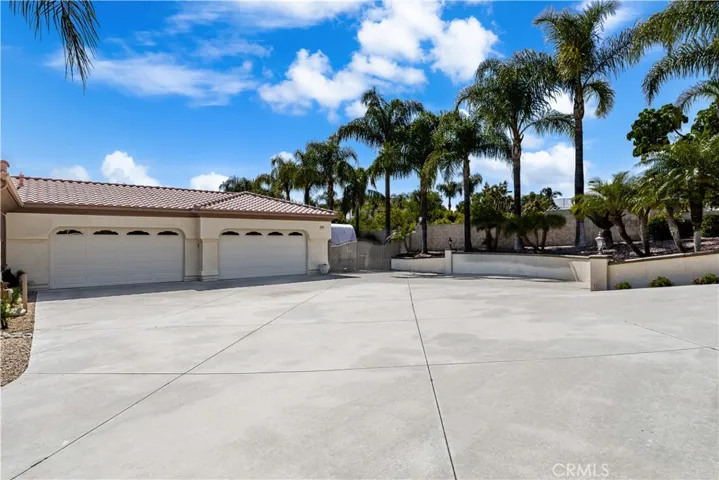 Left Side is the 2 Car Garage and Right Side is the 4 Car Tandem Garage.  RV Parking on Far Side of the Garage