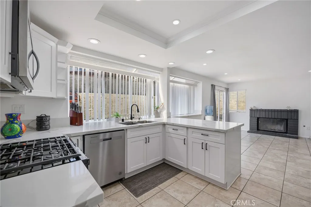 Spacious Upgraded Kitchen With View to the Family Room