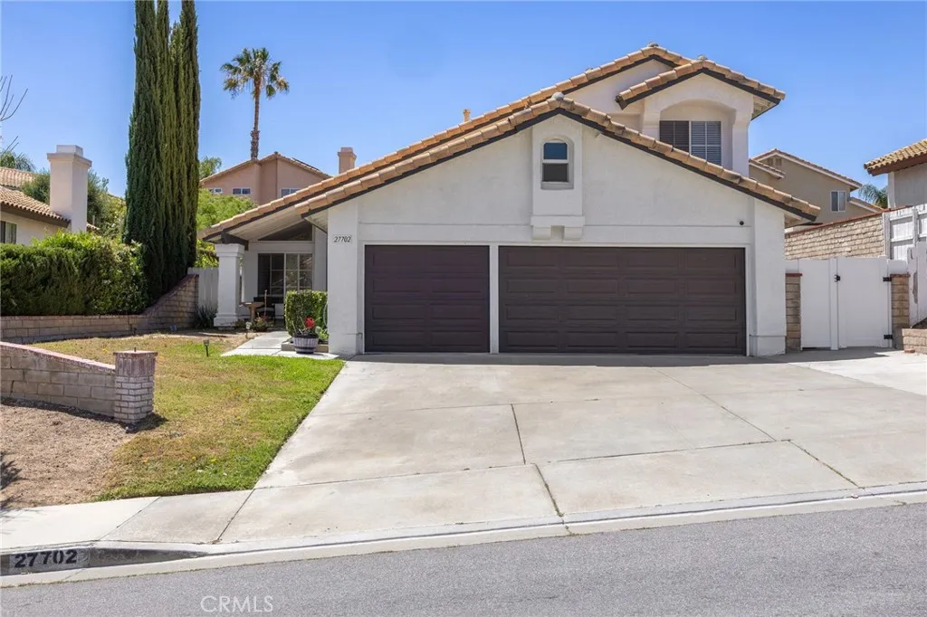 Three Car Garage / Spacious Driveway