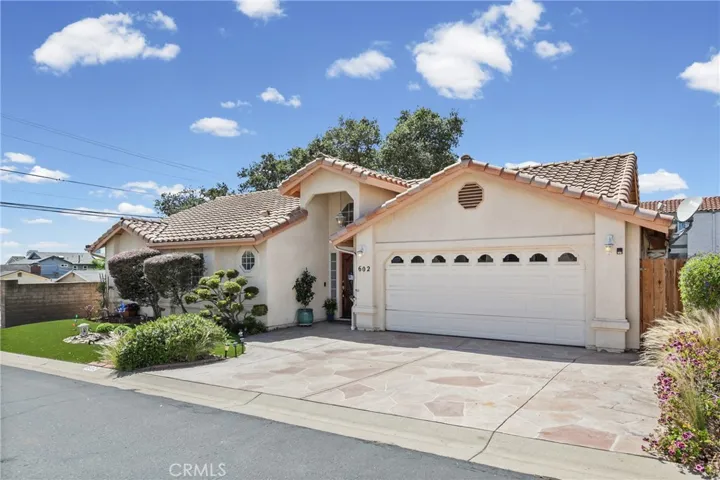 Custom built by highly regarded Hunstad Homes | Extra Wide Driveway