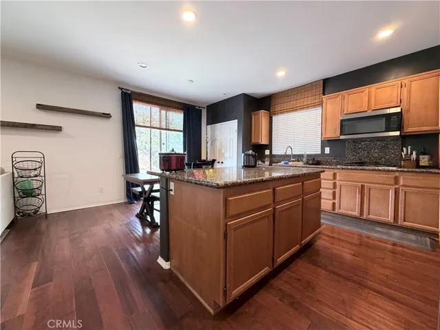 View looking into the kitchen. Note large island with plenty of storage