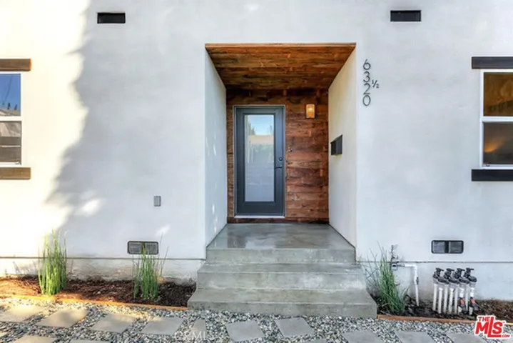 Modern, enclosed entry.