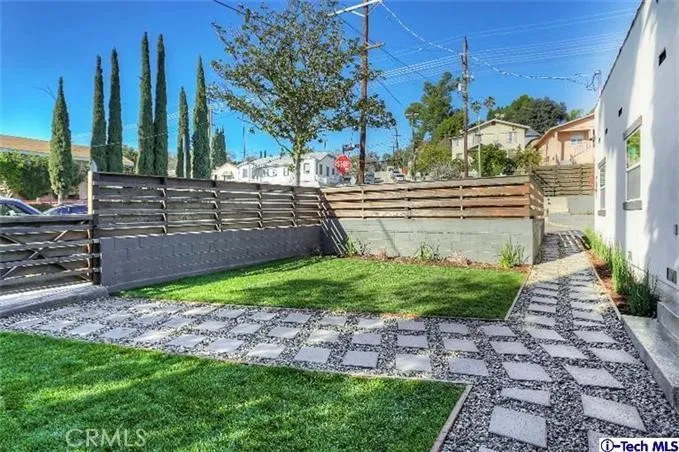 Expansive, grassy patio area solely for this home's use.
