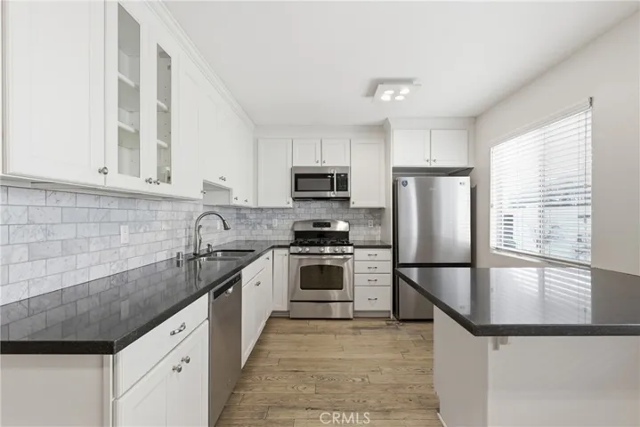 Quartz Counter Tops - Stainless Steel Appliances