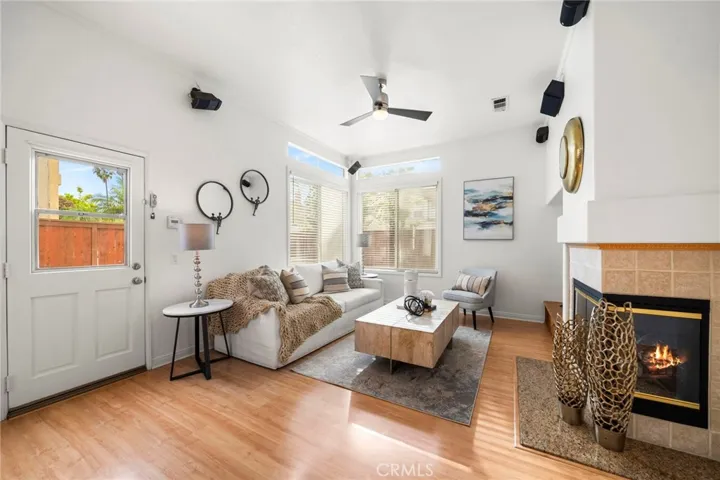 Family Room - Door Leads to Pool/Spa Backyard and Windows Replaced with Tempered Glass as Safety Feature for Swimming Pool.