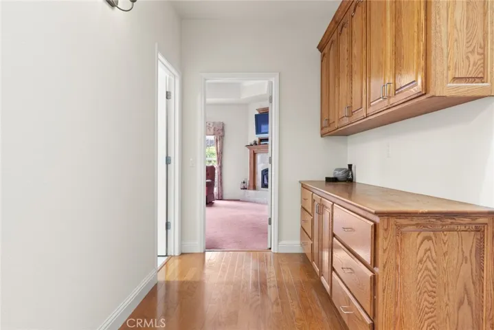 Wide hallway to the Primary Suite.