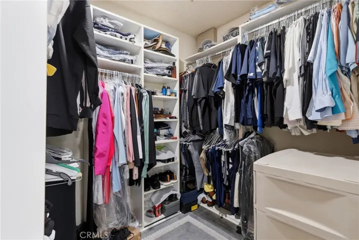main bedroom walk in closet