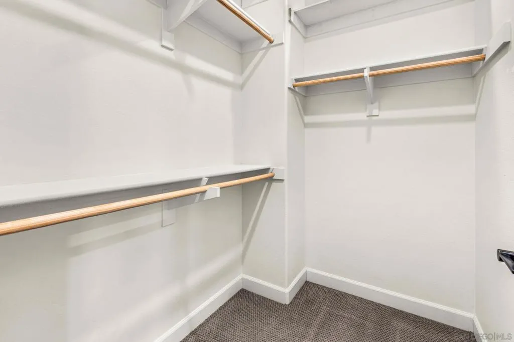 2 identical his and hers walk-in closets