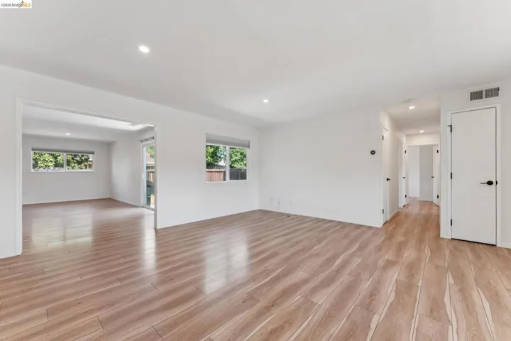 Spare room featuring light wood-style floors and recessed lighting