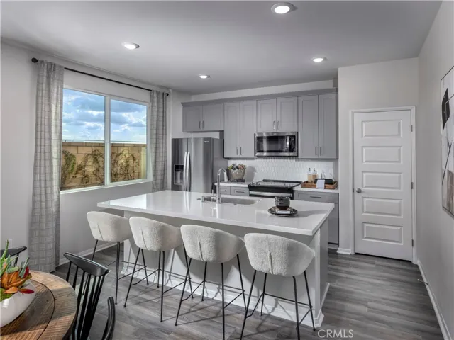 Photo is not of the actual home, but is an inspirational photo of builder’s model home and may depict options, furnishings, and/or decorator features that are not included