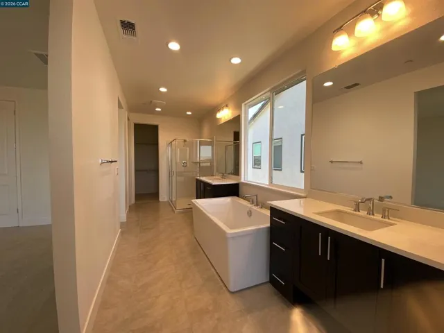 Primary Bath with free standing tub and large shower