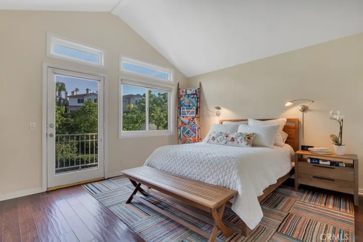Primary bedroom with balcony