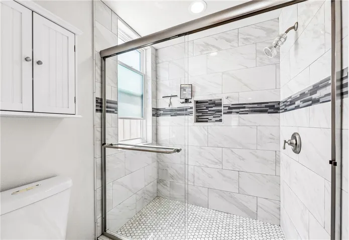 Remodeled oversize shower.