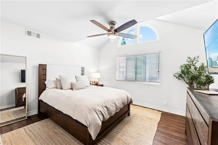 Bedroom 2 vaulted ceilings and tons of natural light.