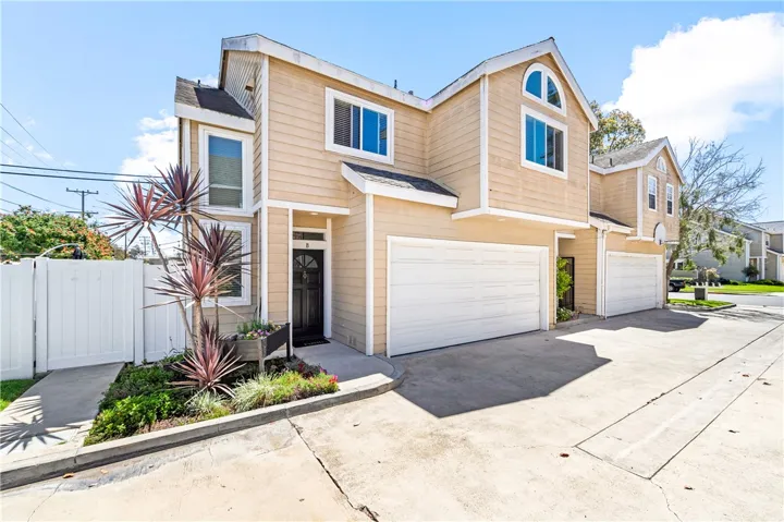 Front entry to the home, backyard gate entry and the driveway.
