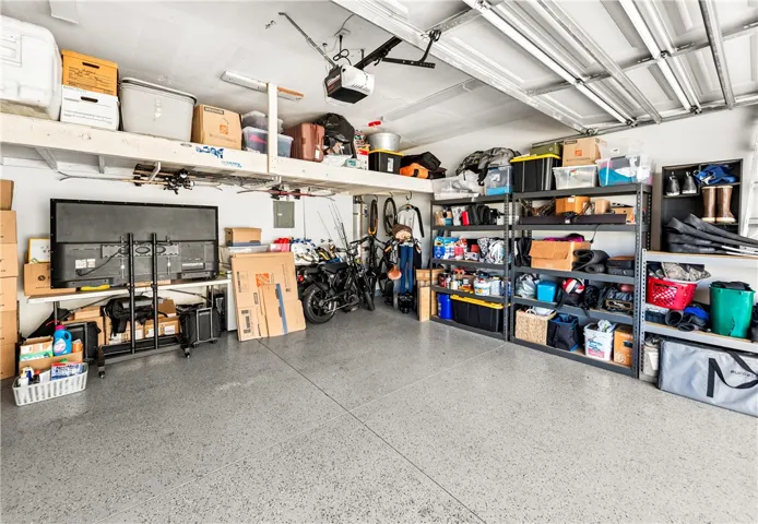 Oversized 2 car garage, Epoxy floors, great built in storage for all your toys!