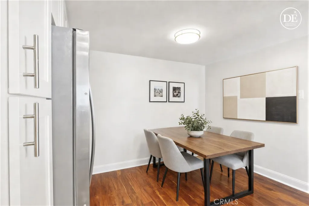 Virtually staged and painted-eat in kitchen area