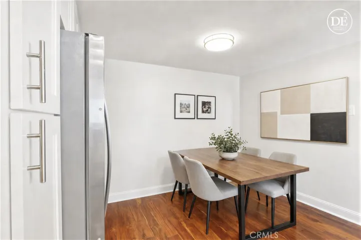 Virtually staged and painted-eat in kitchen area