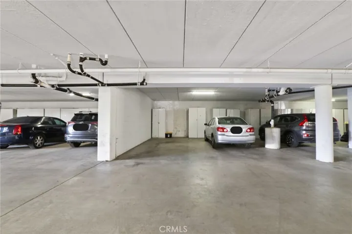 Subterranean parking with storage.