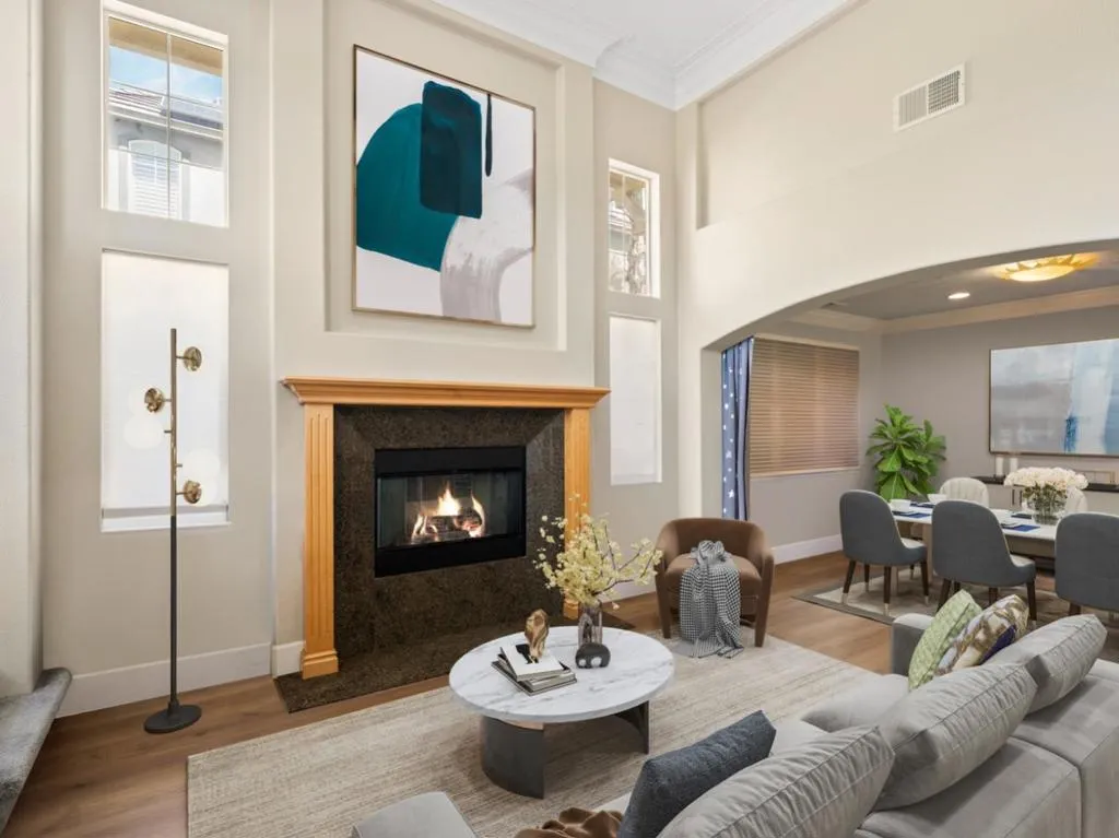 This is digitally staged to show you living room and formal dining room