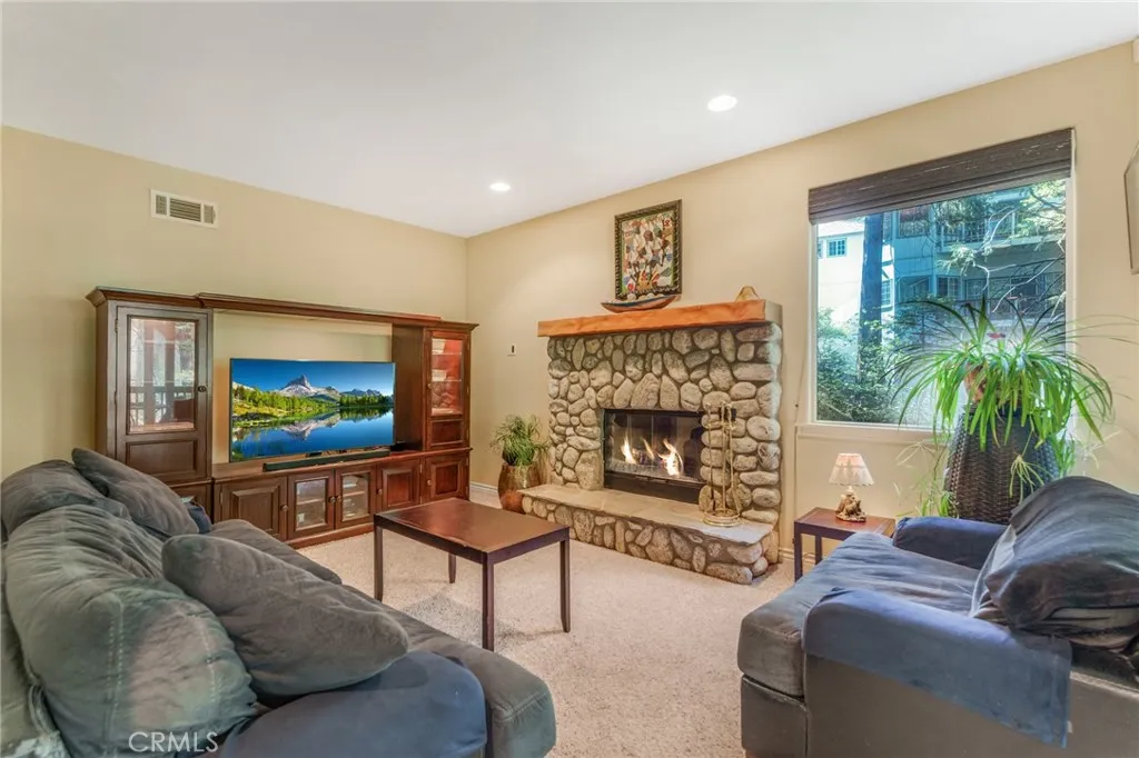 Bottom second floor Family room with fireplace.